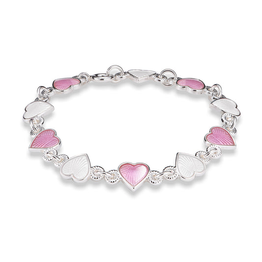 Armbånd i sølv med hvite og rosa emaljehjerter